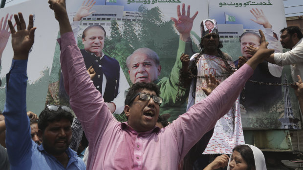 Supporters of former Pakistani prime minister Nawaz Sharif chant slogans on Friday.