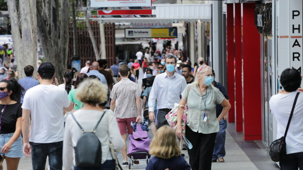 Most people in Brisbane's CBD have complied with the requirement to wear masks.