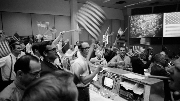 Celebrations on July 24, 1969, at the conclusion of the Apollo 11 mission, from the control room in Houston. 