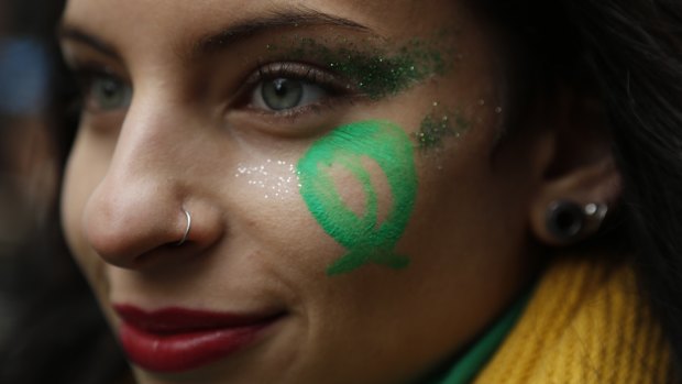 A pro-choice demonstrator participates in a concentration to support an abortion legalisation law, in Buenos Aires.