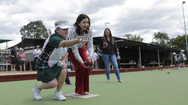 Ms Palaszczuk gets some pointers at the Nerang Bowls Club on Monday.
