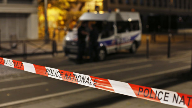 Police secures the site of a knife attack in Paris.