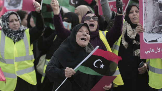 Women take part in a protest against Libya's Field Marshal Khalifa Hifter, who is leading an offensive to take over Tripoli.