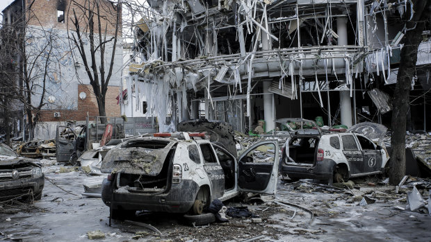 Damaged vehicles and buildings in Kharkiv city centre on Wednesday: Russia should pay reparations for the destruction of Ukraine.