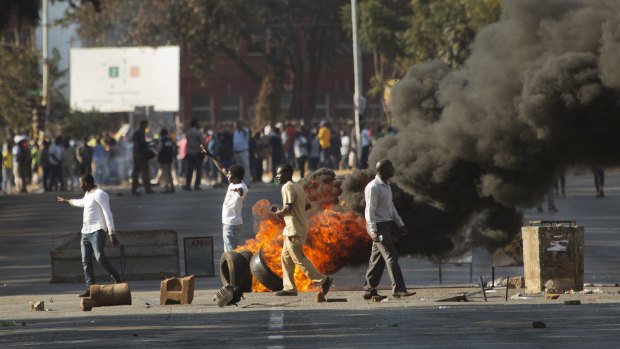 Zimbabweans protest in downtown Harare.