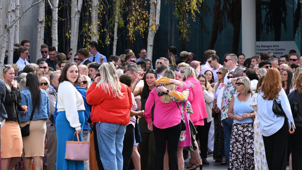 Mourners at a memorial service for TV presenter Jesse Baird in Melbourne. 