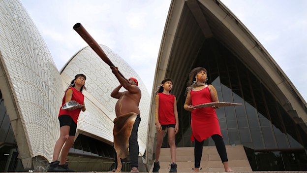 Russell Dawson with daughter Sienna (far right) and sisters Jade (far left) and Mia Welsh, part of the Koomurri dance troupe and set to perform on Australian Day.