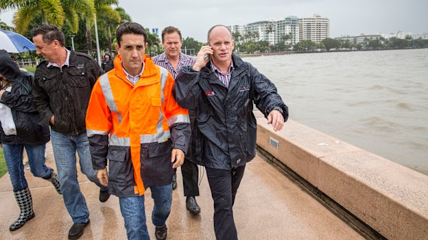 Current LNP Opposition Leader David Crisafulli (left) with Newman in Cairns as Cyclone Ita approaches in 2014.