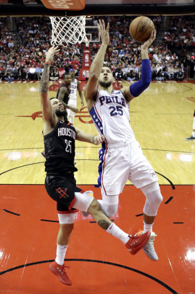 Key man:  Ben Simmons  goes to the basket against the  Houston Rockets. 