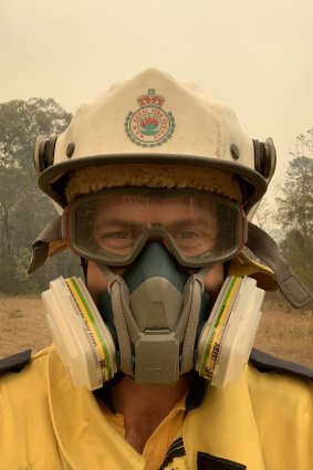 Firefighter Andrew Hain in the half-face respirator he called a "game-changer". 