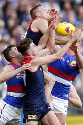 Tom McDonald, Easton Wood, Bayley Fritsch and Alex Keath compete for the ball. 