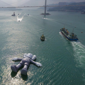 Kaws: Holiday 2019 inflatable sculpture in Hong Kong's Victoria Harbour.