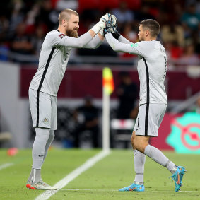 The change that got Australia to the World Cup: Redmayne (left) comes on for Mat Ryan.