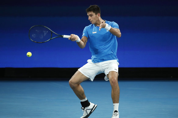Michail Pervolarakis of Greece plays a forehand in his Group B singles match at the 2021 ATP Cup in Melbourne on February 5. 