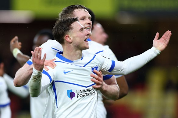 Adrian Segecic celebrates a goal for Portsmouth.