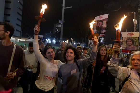 Protesters calling for the return of hostages held in the Gaza Strip react in Tel Aviv after a deal was reached.