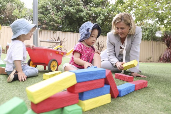 Nicola Forrest, co-chair of the Minderoo Foundation, meets with children at a Goodstart Early Learning Centre in Canberra. She is lobbying politicians to overhaul the childcare system to make it universally accessible and affordable.