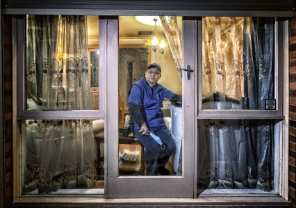 Prahran Market trader Ting Gao, owner of Periwinkle Fine Seafood, is isolating at home.