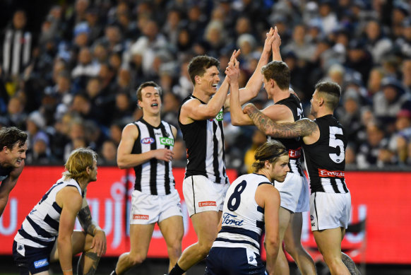 Collingwood celebrate as the Cats are left to rue their missed chances and prepare for a tough match next week.