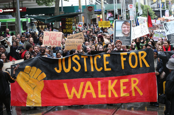 Protesters march in Melbourne on Wednesday.