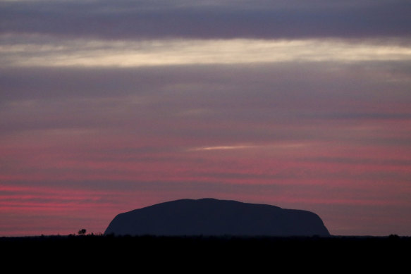 Sunrise over Uluru on Sunday, two days after a permanent climbing ban came into effect.