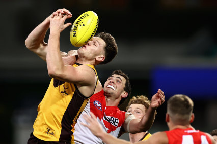 Hawthorn’s Jacob Koschitzke attempts a mark against the Swans on Friday night.