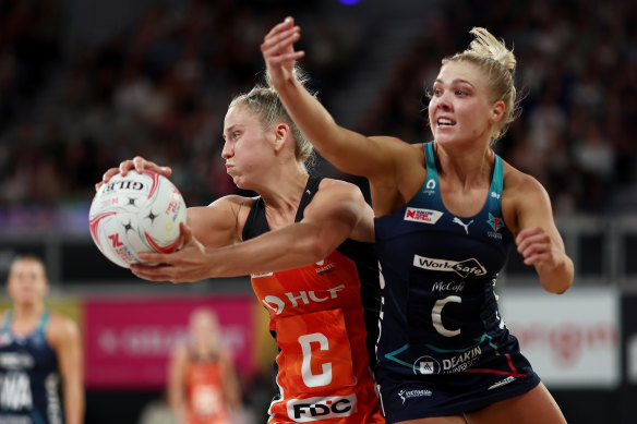 amie-Lee Price of the Giants is challenged by Kate Moloney of the Vixens during the round three Super Netball match between Melbourne Vixens and Giants Netball at John Cain Arena, on April 02, 2023, in Melbourne, Australia. (Photo by Matt King/Getty Images)