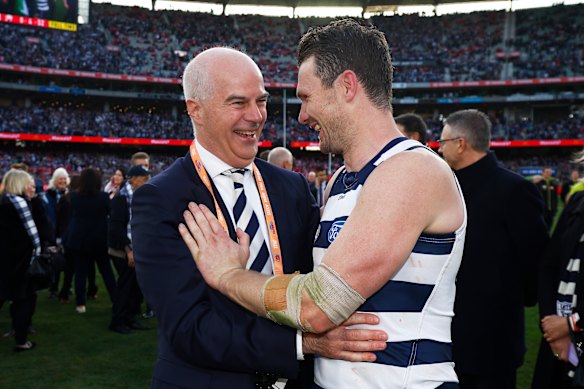 Before he became AFL chairman, Drummond was Geelong’s president. Here he celebrates the Cats’ 2022 grand final win with Patrick Dangerfield.