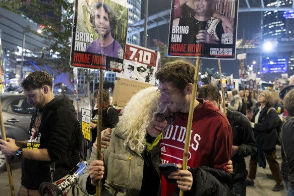 Protesters in Tel Aviv calling for the return of hostages held in the Gaza Strip react after a ceasefire and hostage release deal was reached.