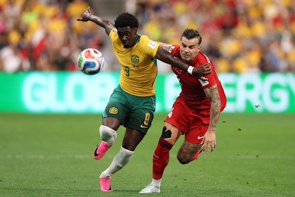 Mohamed Toure in action against Turkey.