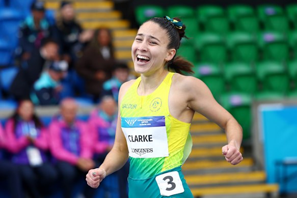 Rhiannon Clarke of Team Australia celebrates as she crosses the finish line to win the women’s 200m T38 final.