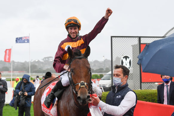 A jubilant John Allen returns to the mounting yard aboard State Of Rest before the protest.