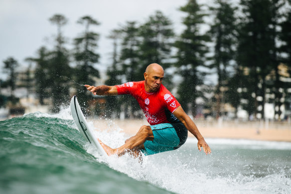 Surfing legend Kelly Slater has expressed scepticism about vaccines, including in social media posts supportive of Novak Djokovic.