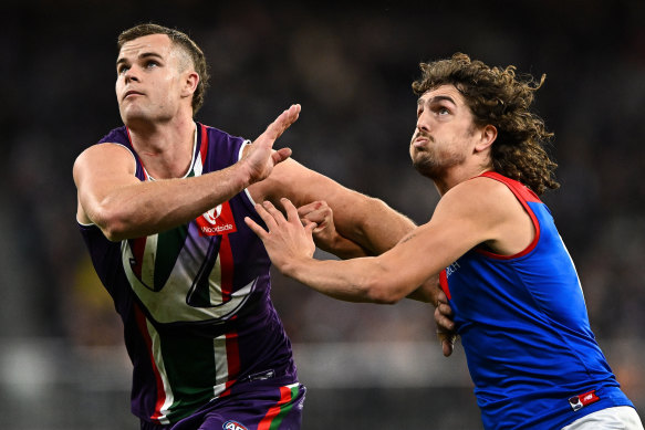 Former Demon Luke Jackson in action against his new Dockers teammate Sean Darcy at Optus Stadium on July 29, 2022.