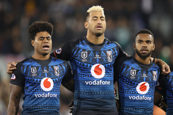 Kevin Naiqama, Viliame Kikau and Sunia Turuva sing the Fijian national anthem.