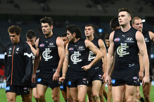 Carlton players leave the ground after the loss to St Kilda.