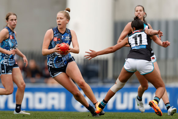 Paige Trudgeon on the run for the Blues.