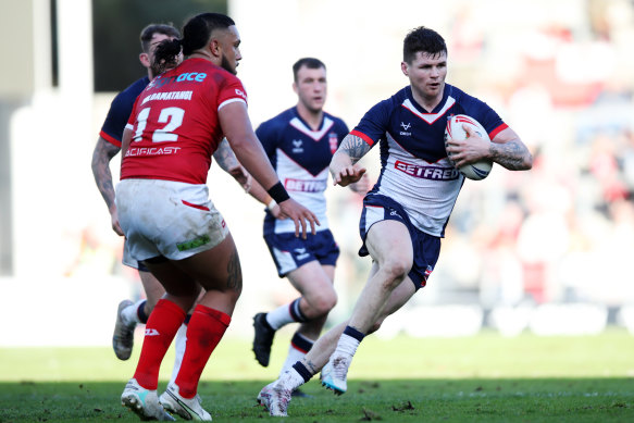 John Bateman helped England to a 22-18 win over Tonga in what would have been Dominic Young’s sixth Test.