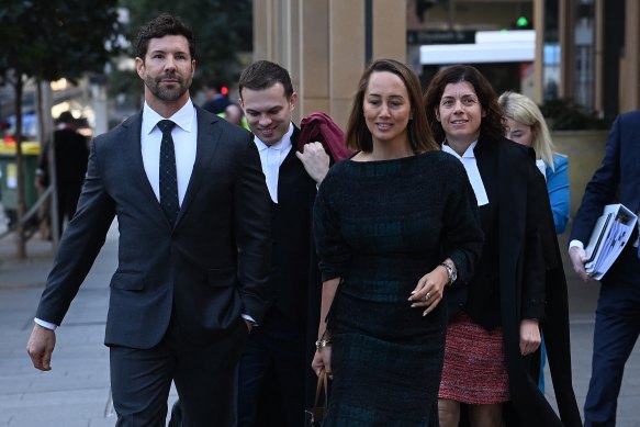 Heston Russell, left, and his legal team outside the Federal Court in Sydney on Friday.