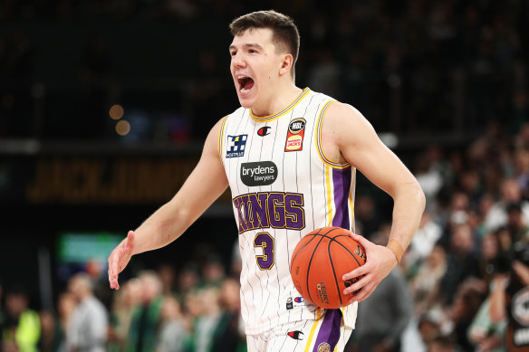 Dejan Vasiljevic celebrates winning game two of the NBL grand final series.