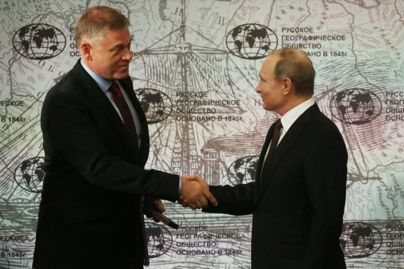 Alexander Abramov (left) with Russian President Vladimir Putin in St Petersburg in 2017.
