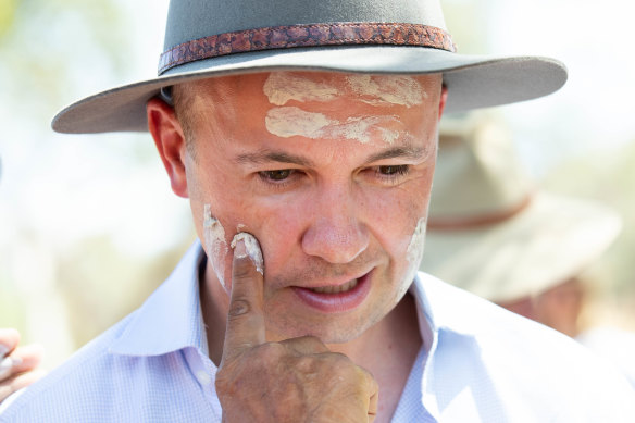Not war but welcome paint: NSW Environment Minister, Matt Kean, at the ceremonial signing of over 15,000 hectares to the Mount Grenfell Historic Site.