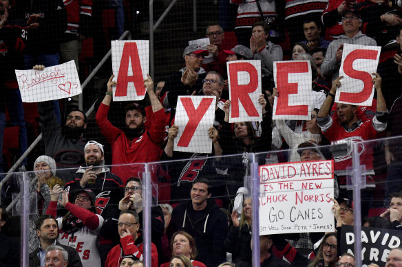 Hurricanes fans show their love for Ayres at their next home game against Dallas.