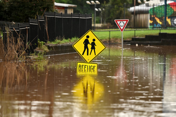 Floodwater inundate a road on March 29, 2022 in Lismore, Australia. It is the second major flood event for the region this month. 