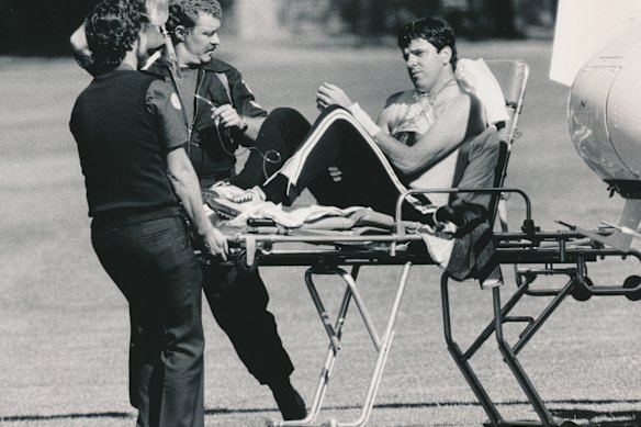 Rod MacDonald is stretchered from a police helicopter after the shootout with Pavel Marinof on February 25, 1986.
