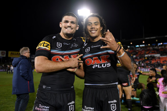 Nathan Cleary and Jarome Luai celebrate a third premiership.