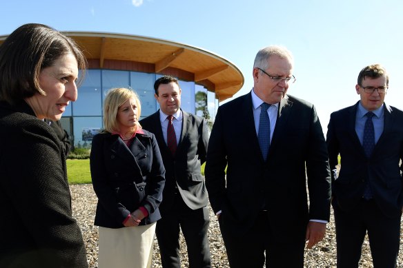 Premier Gladys Berejiklian (left) and Prime Minister Scott Morrison (second from right) at the site of the new Western Sydney International Airport.