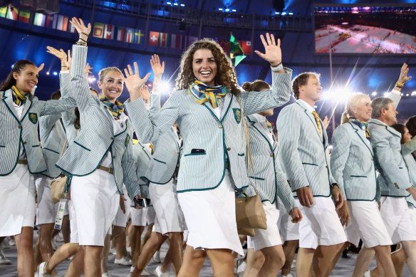 Jessica Fox (centre) walks out with Australian teammates at Rio opening ceremony in 2016.