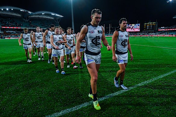 Patrick Cripps leads the Blues off the field after another loss, this time to the Crows at Adelaide Oval.