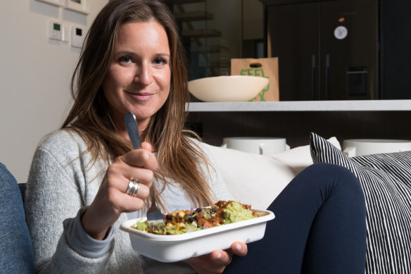 Laelia Martin tucking into a healthy Zambrero burrito bowl.